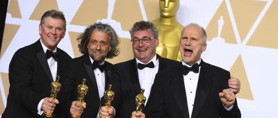 Gerd Nefzer (zweiter von rechts) gewann mit seinen drei Kollegen den Oscar für die besten visuellen Effekte. Foto: Jordan Strauss/Invision/dpa-Bildfunk.